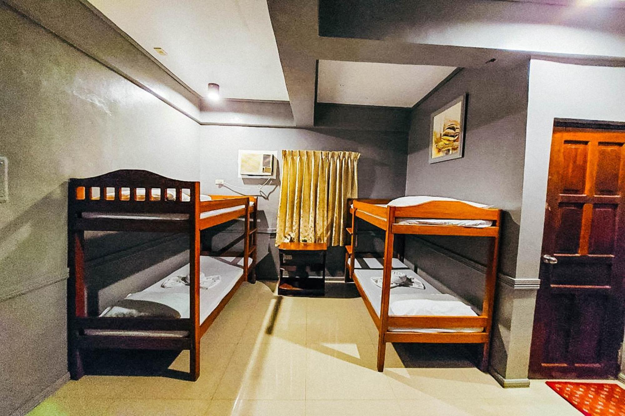 Mbg Travellers Inn Powered By Cocotel 公主港 客房 照片