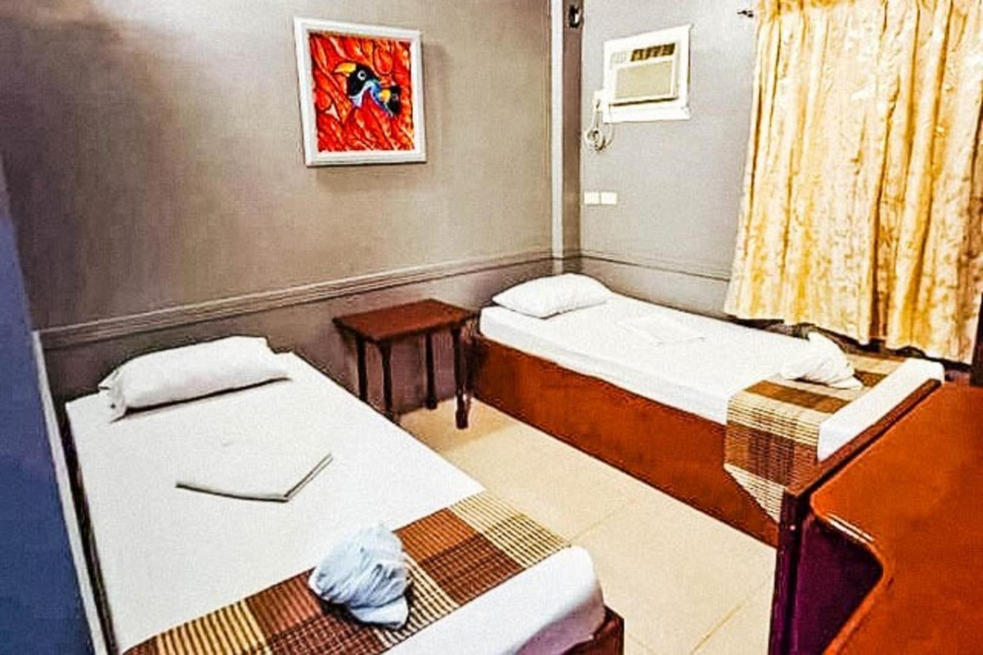 Mbg Travellers Inn Powered By Cocotel 公主港 客房 照片