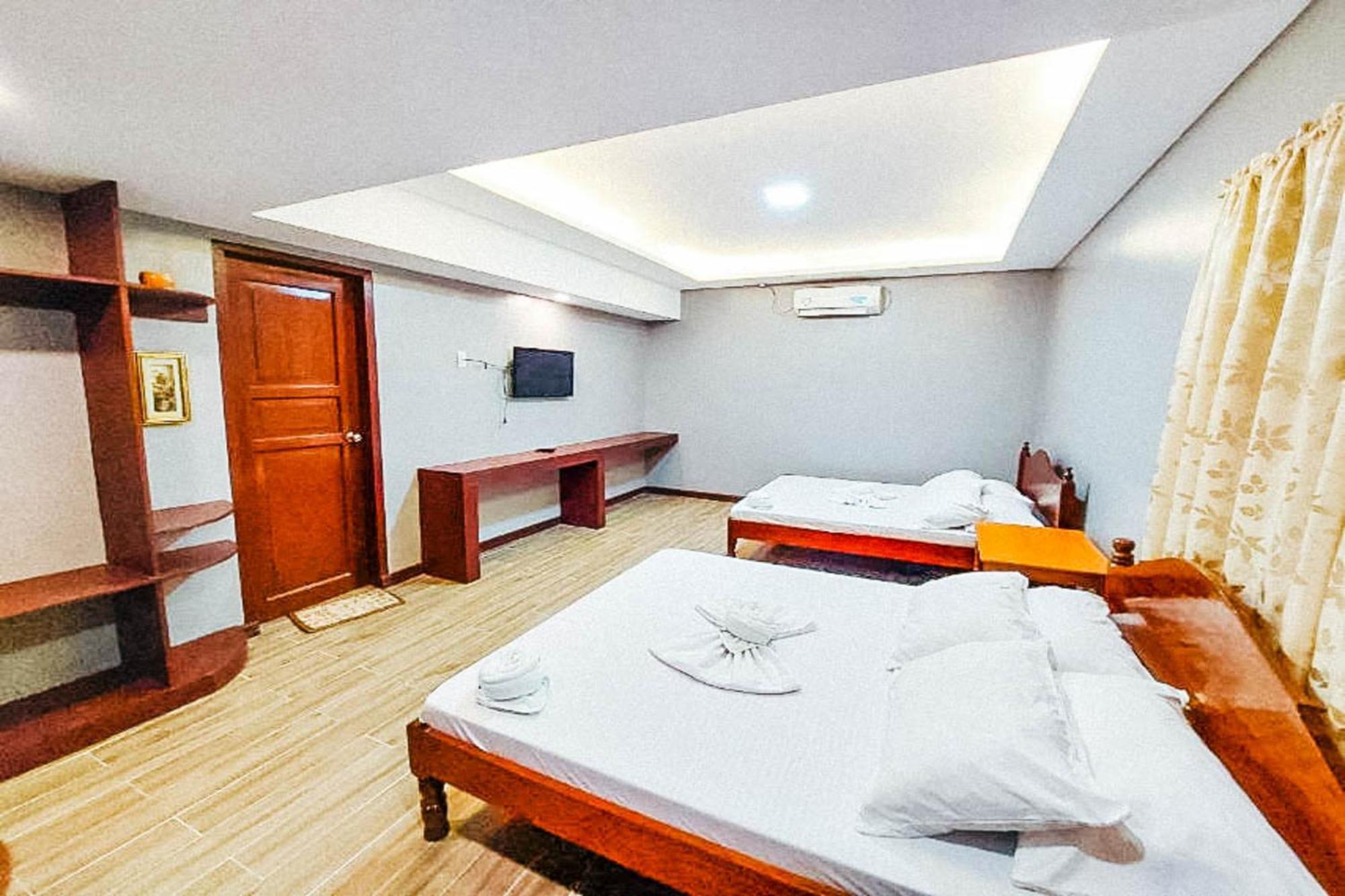 Mbg Travellers Inn Powered By Cocotel 公主港 客房 照片